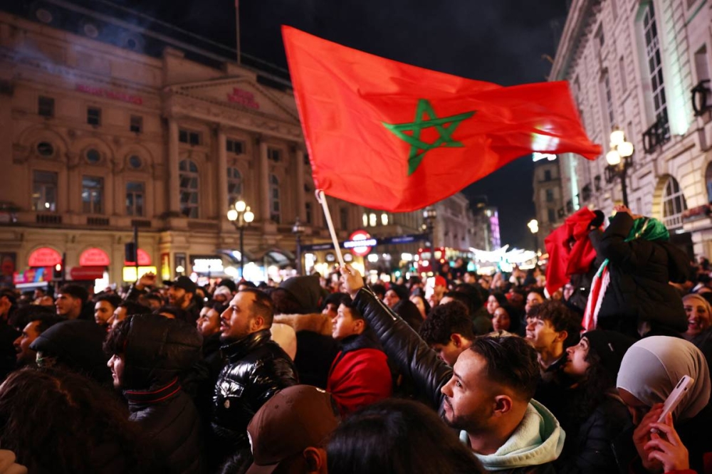 فرحة مشجعي منتخب المغرب بعد الفوز علي البرتغال