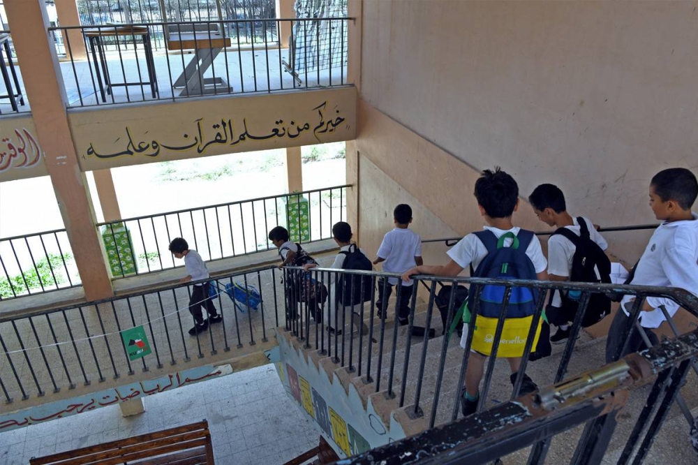 حضور محدود للطلبة  (تصوير عوض التعمري)