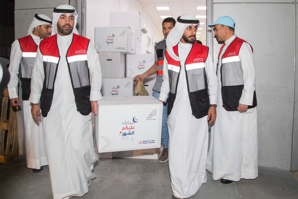 توزيع ماجلة رمضان على الأسر المتعففة