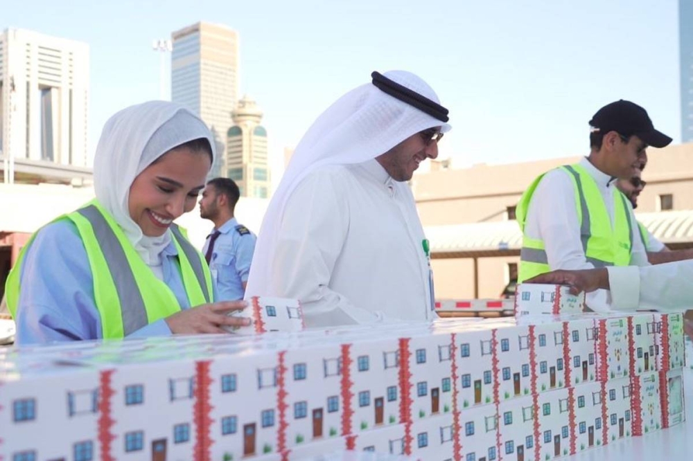 فريق «بيتك» التطوعي يوزع القرقيعان