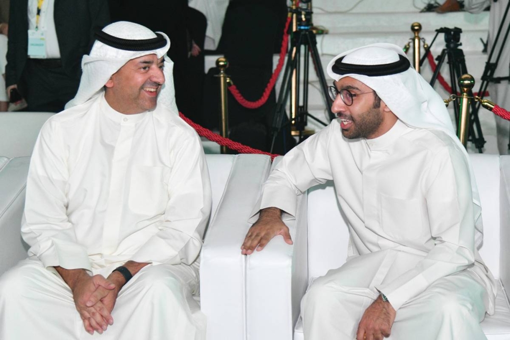 عثمان بودي ووليد الخشتي خلال الحفل