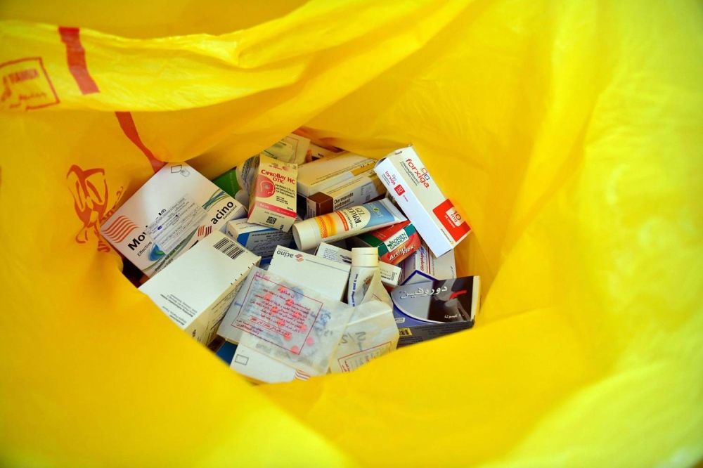  تجميع الادوية في حاويات خاصية بالحملة 