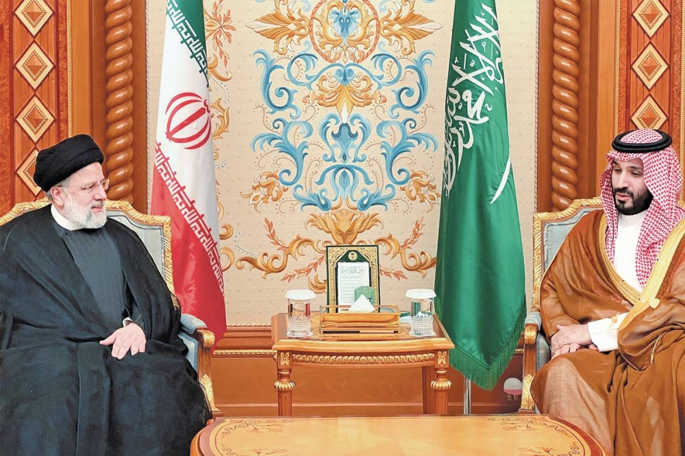 بن سلمان ورئيسي على هامش القمة