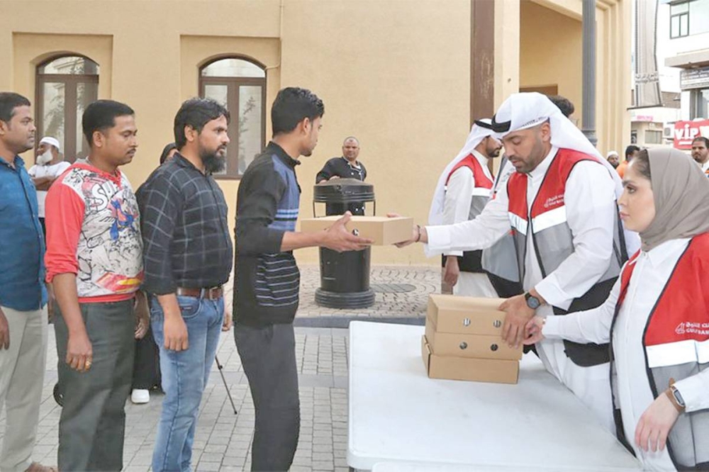 توزيع وجبات إفطار صائم