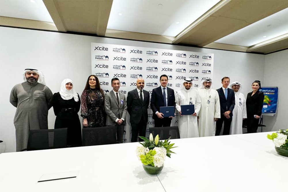 العثمان وإبراهيم خلال توقيع الشراكة