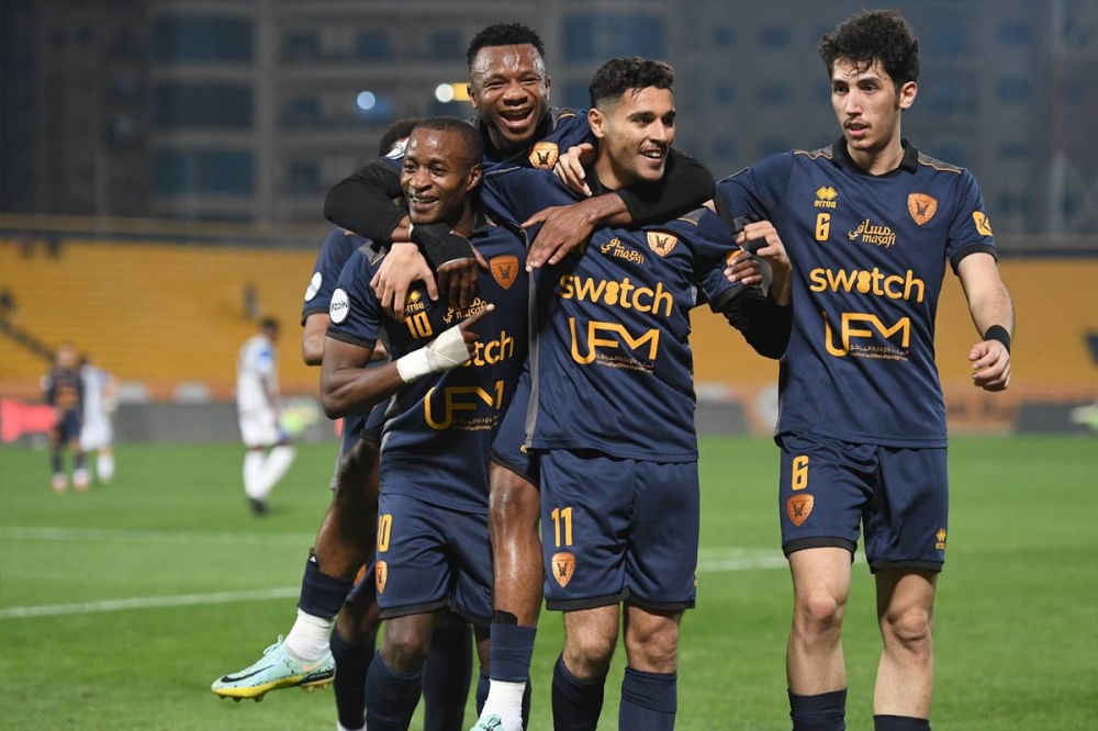 لاعبو القادسية يحتفلون خلال إحدى المباريات