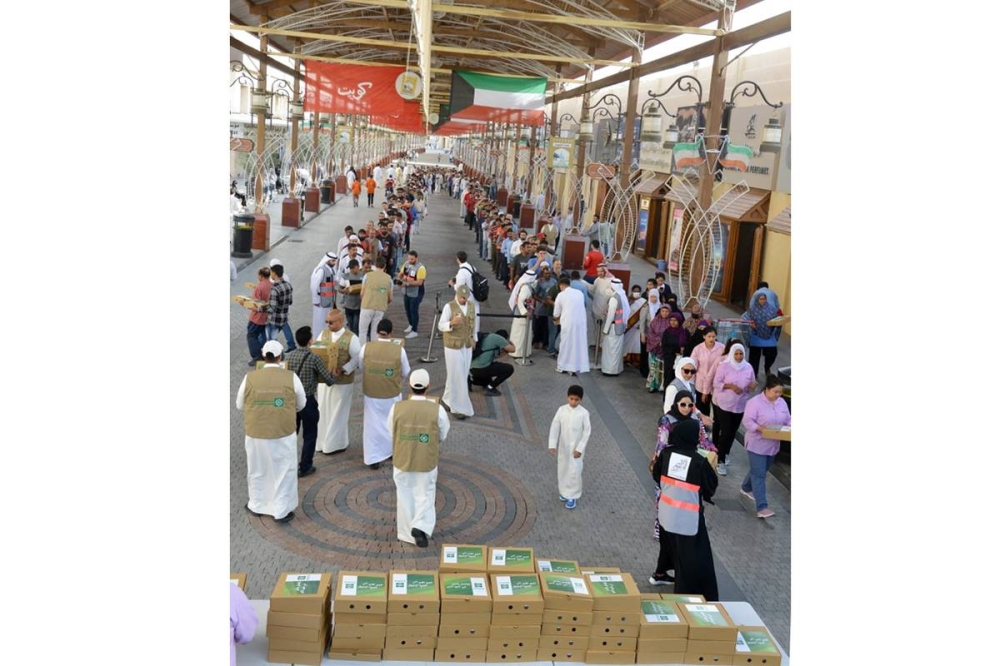 توزيع وجبات إفطار صائم في المباركية