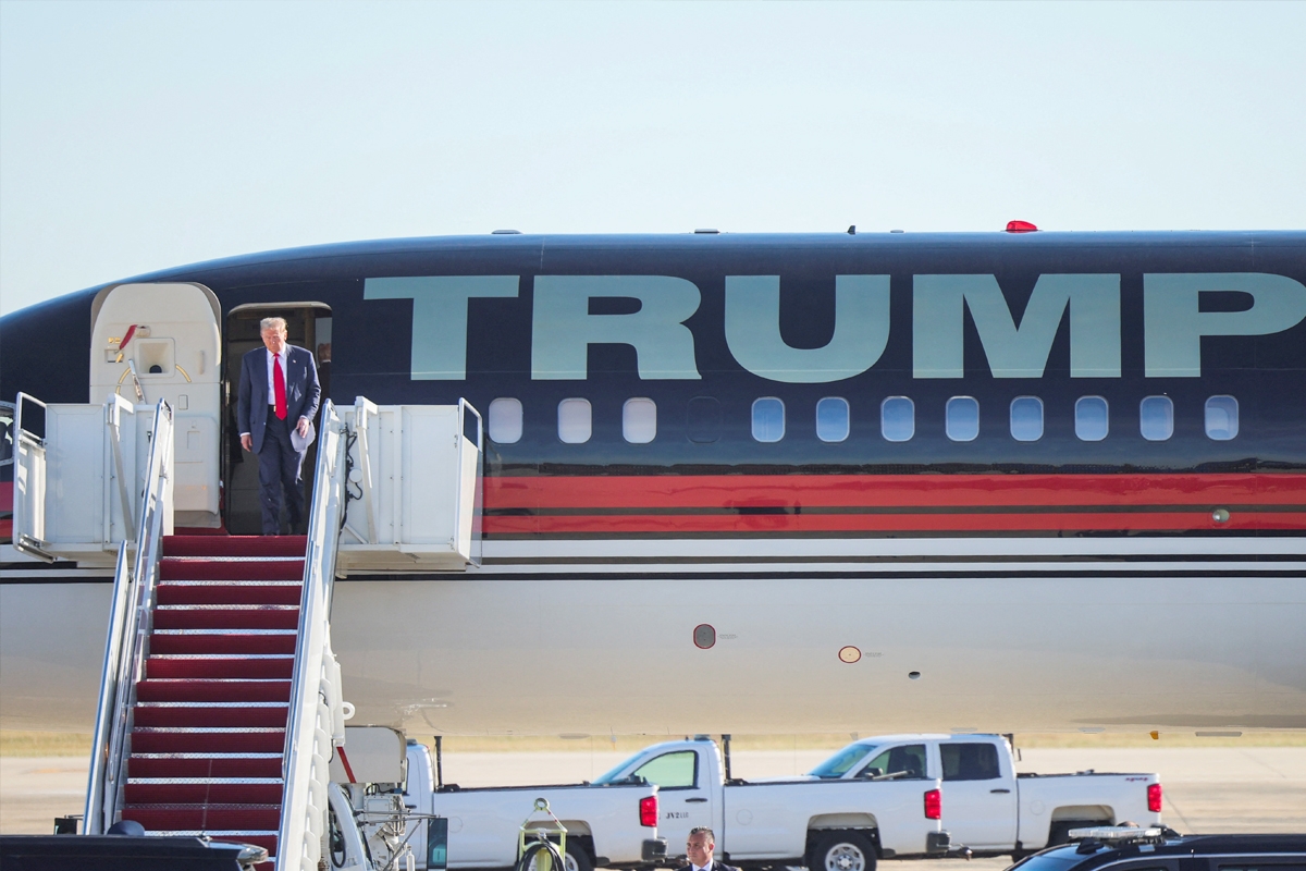 ترامب يصل إلى واشنطن أمس (رويترز)