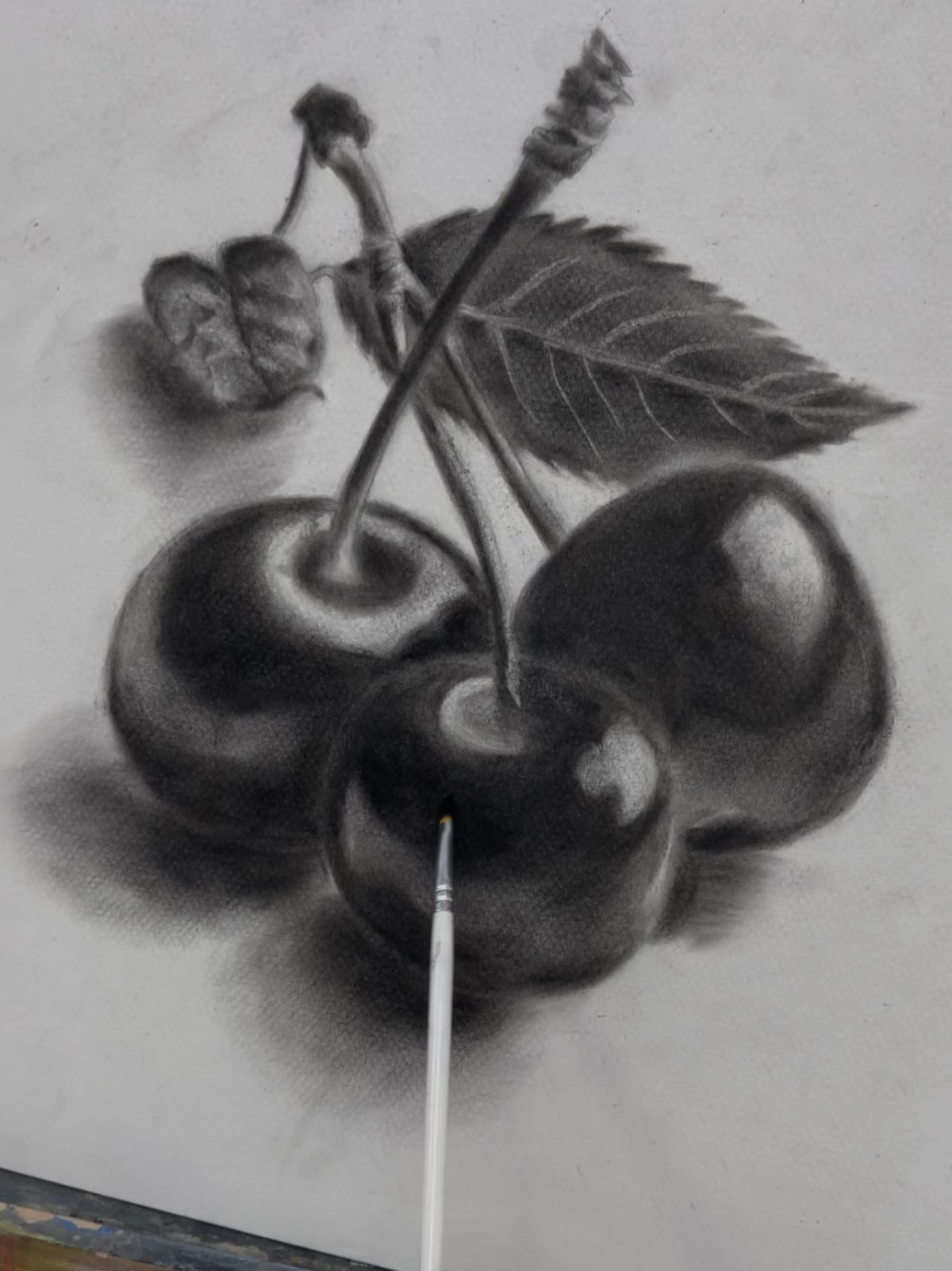 من أعماله في الرسم بالفحم