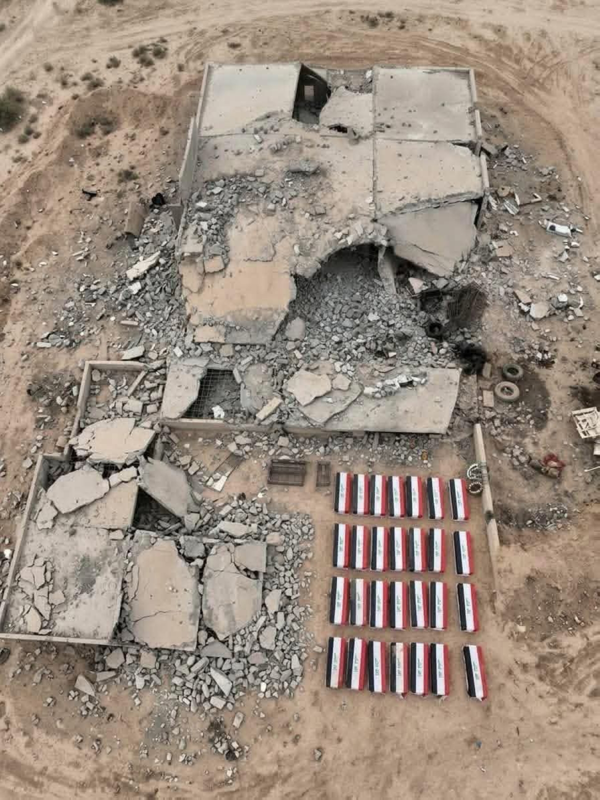 صورة تداولتها مواقع عراقية لمبنى للحشد استهدف في منطقة القائم