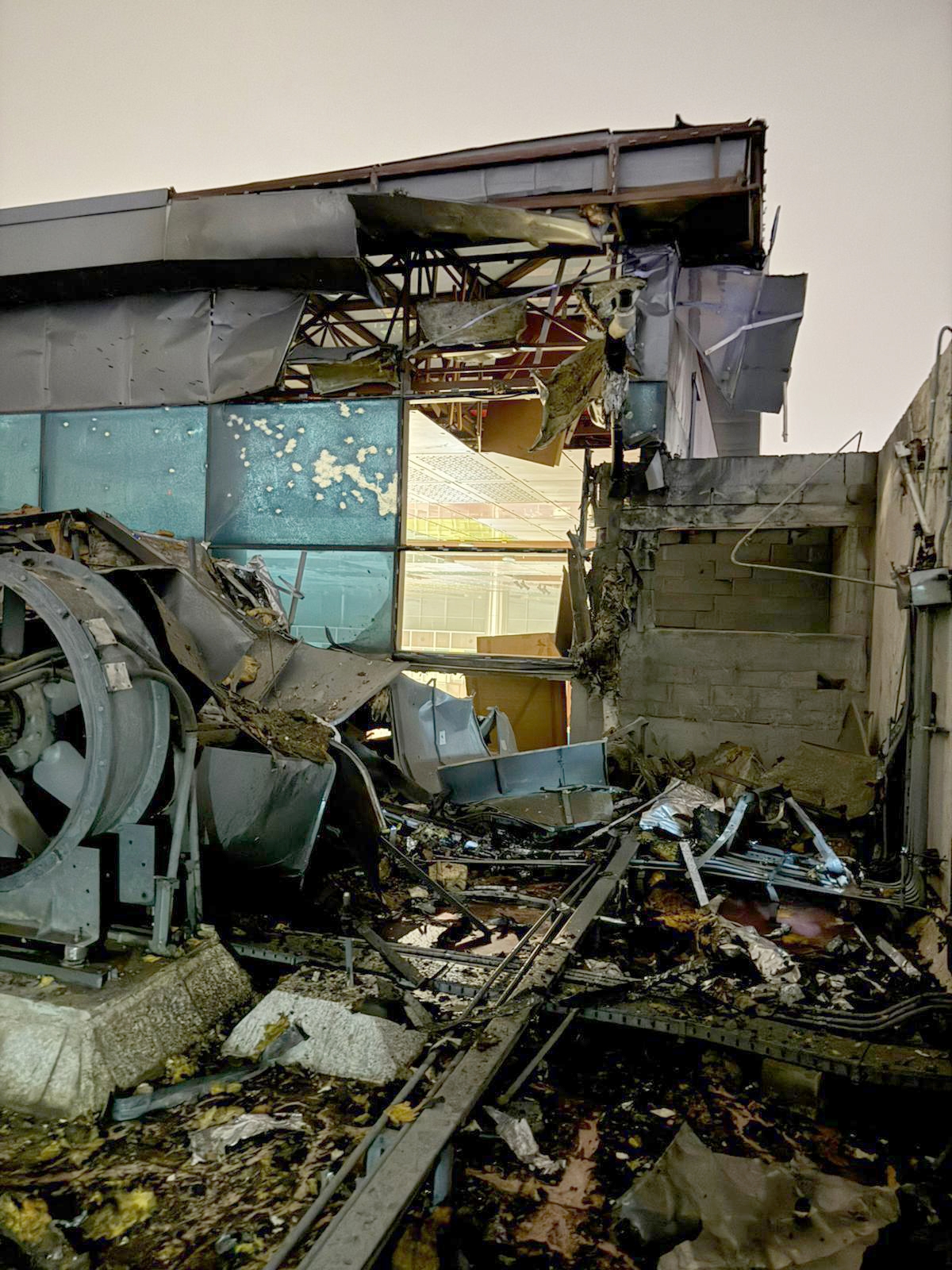 من آثار استهداف أحد المجمعين