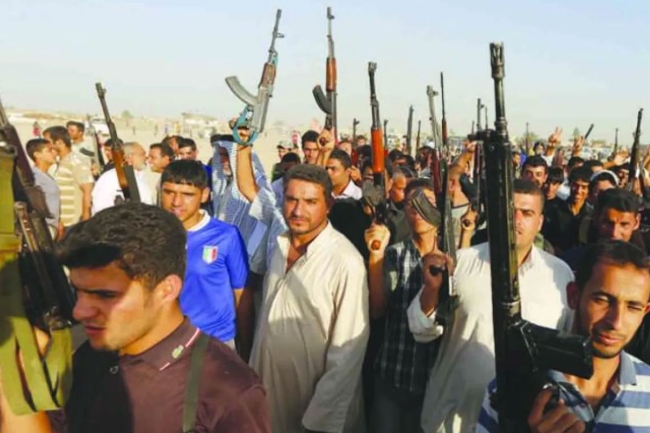 العراق: المقاومة الإسلامية تشترط خروج القوات الأميركية لتنظم السلاح