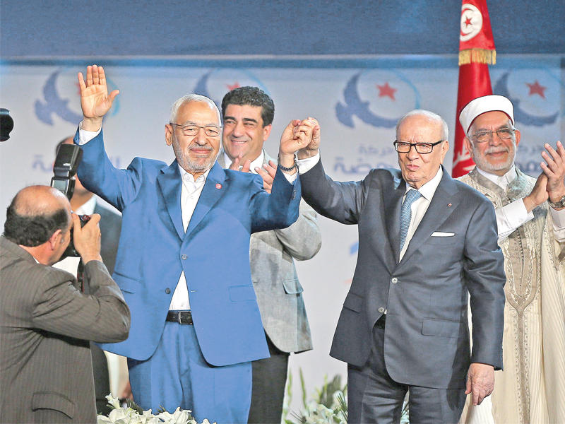 الغنوشي والسبسي خلال افتتاح المؤتمر أمس الأول في تونس 