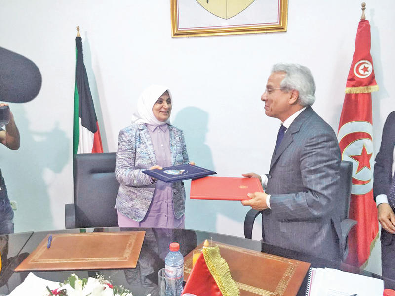 الصبيح ونظيرها التونسي عقب توقيع الاتفاقية