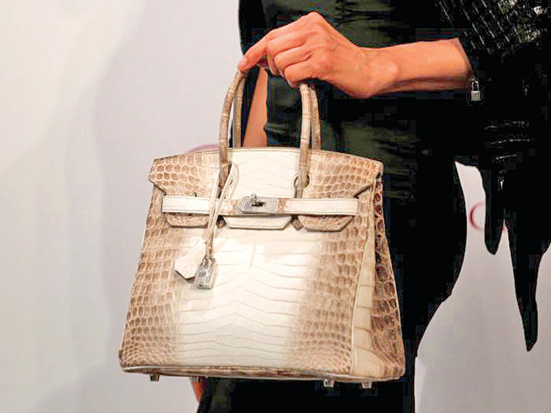 حقيبة يد من جلد التمساح 