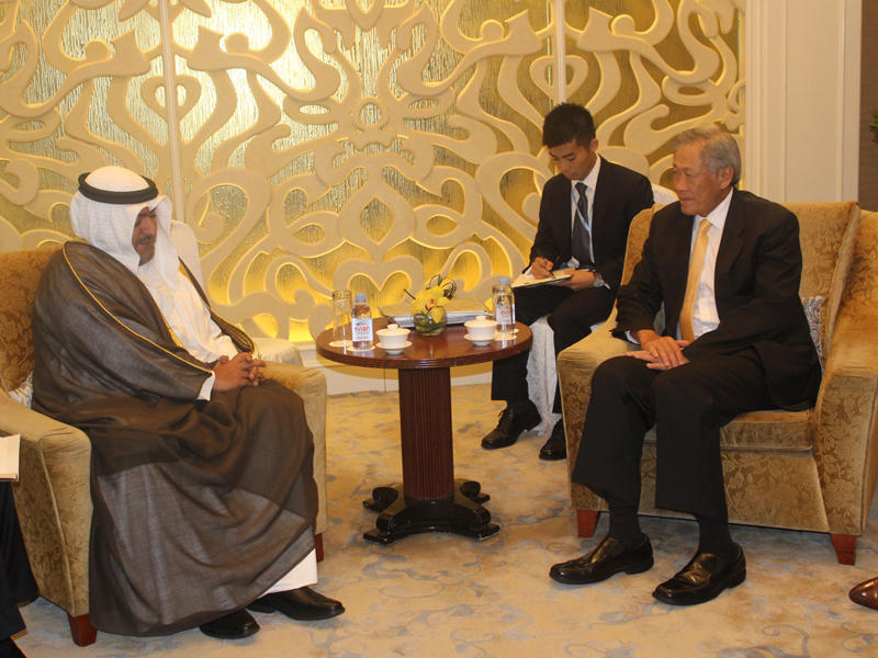 ثامر العلي ووزير الدفاع السنغافوري