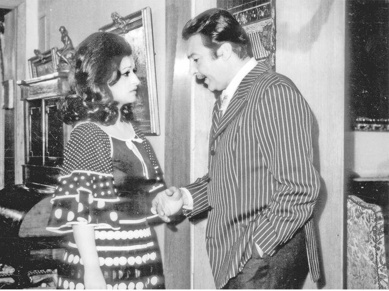 وردة ورشدي أباظة في مشهد من فيلم {حكايتي مع الزمان}n