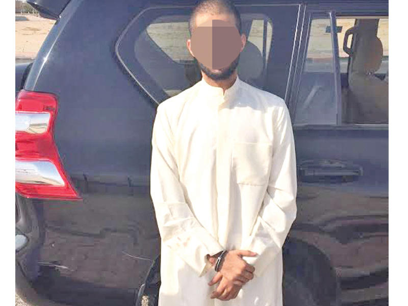 القاتل بعد ضبطه