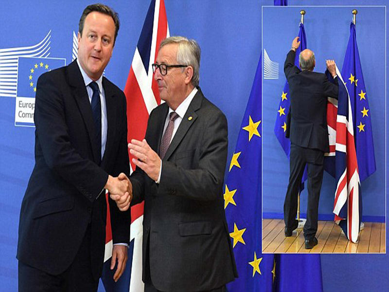 كاميرون يصافح يونيكر أمس