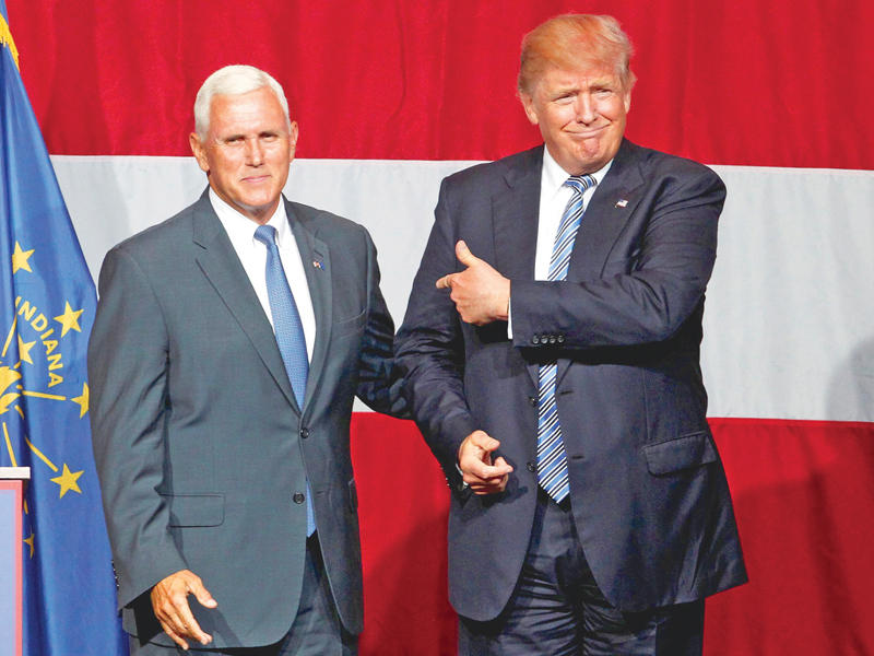 ترامب وبنس في ولاية إنديانا الثلاثاء  (رويترز)