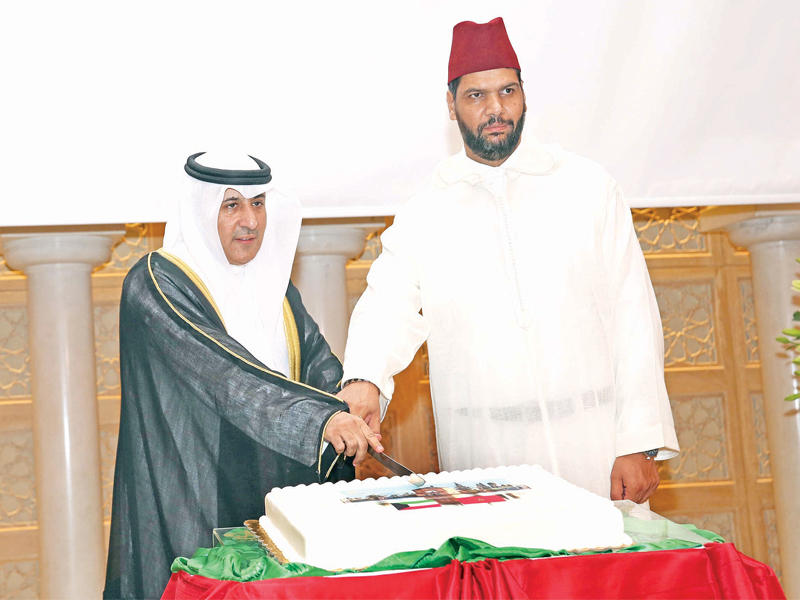 عزيز الديحاني والقائم بالأعمال المغربي المهدي الرامي