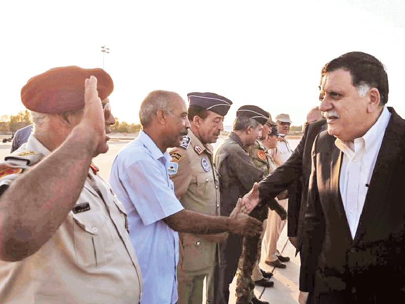 السراج يتفقد مقر عملية «البنيان المرصوص» في مصراتة أمس الأولt(أ ف ب)