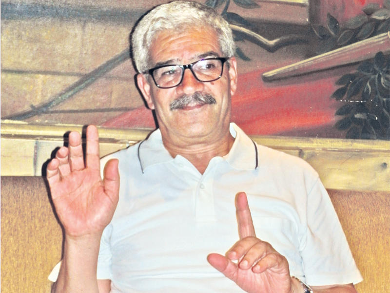 الخطّاط التونسي عمر الجمنيn