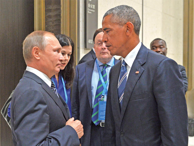 نظرات قاسية بين أوباما وبوتين خلال لقائهما أمس على هامش قمة العشرين في مدينة هانغشتو الصينية (أ ف ب) 