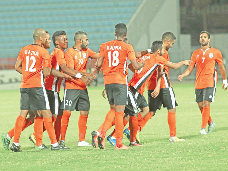 لاعبو كاظمة في لقاء سابق