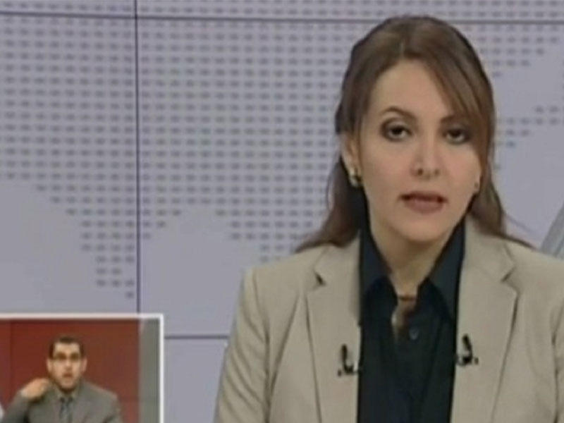 صورة مأخوذة عن التلفزيون تظهر المذيعة التي ارتكبت الهفوة