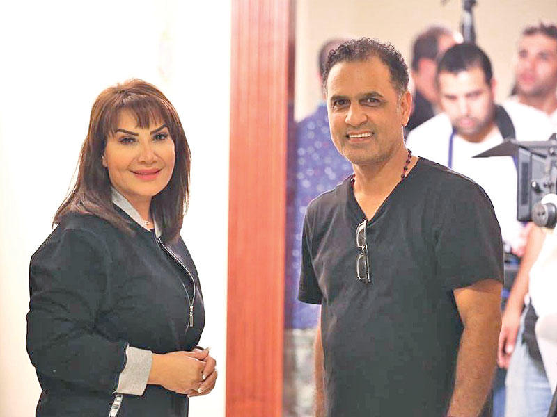 محمد القفاص وهدى حسين أثناء تصوير «حياة ثانية»