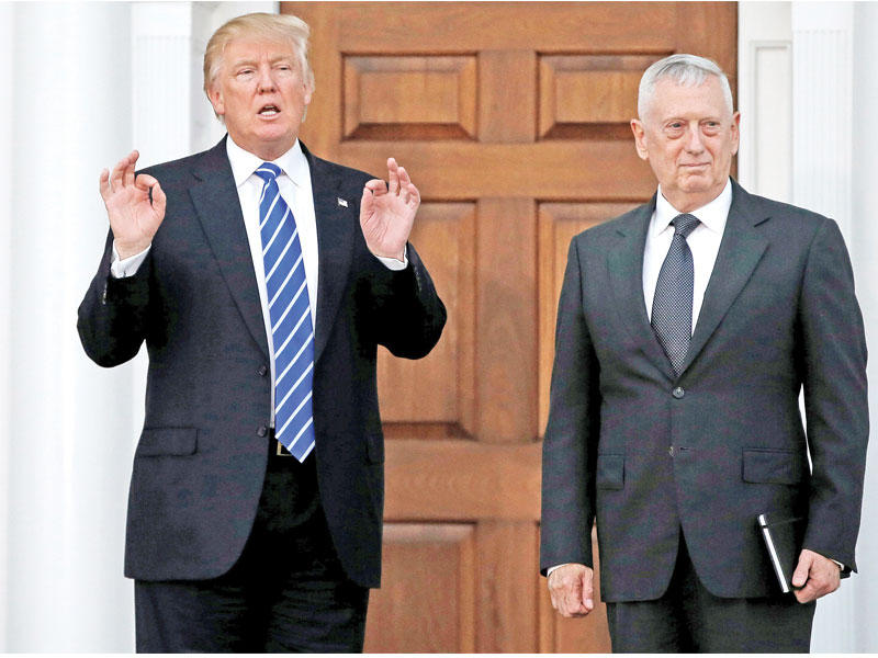 ترامب مستقبلاً ماتيس أمس الأول في نيوجرسي  (رويترز)