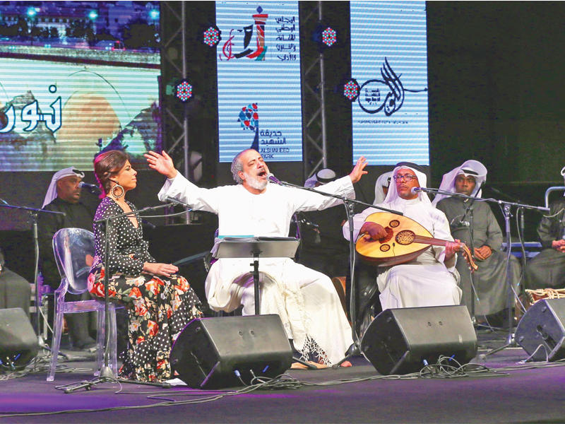 سلمان العماري وعامر التوني ودافينيا جان أثناء الحفل 