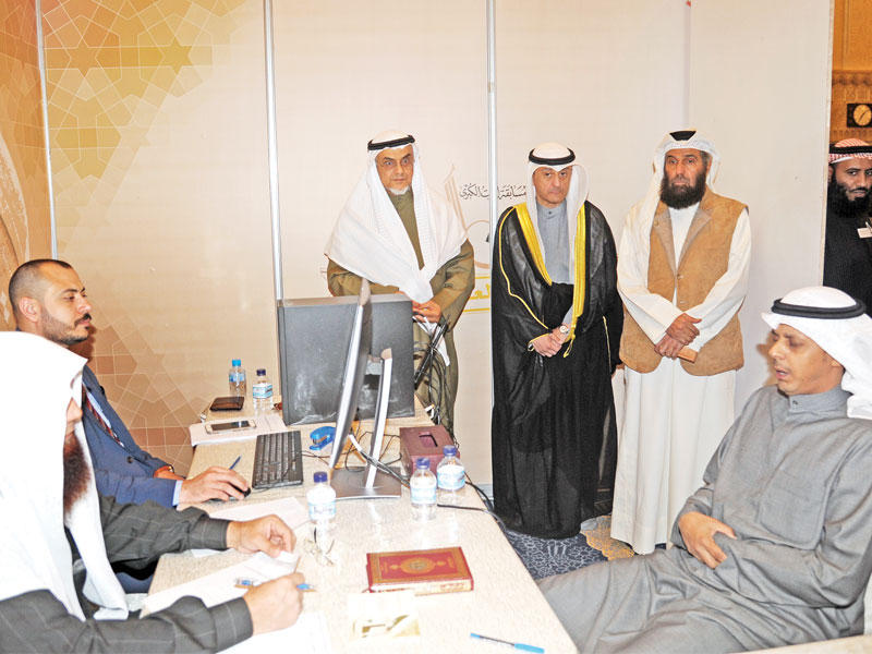 الخرافي وسنان خلال متابعة التصفيات