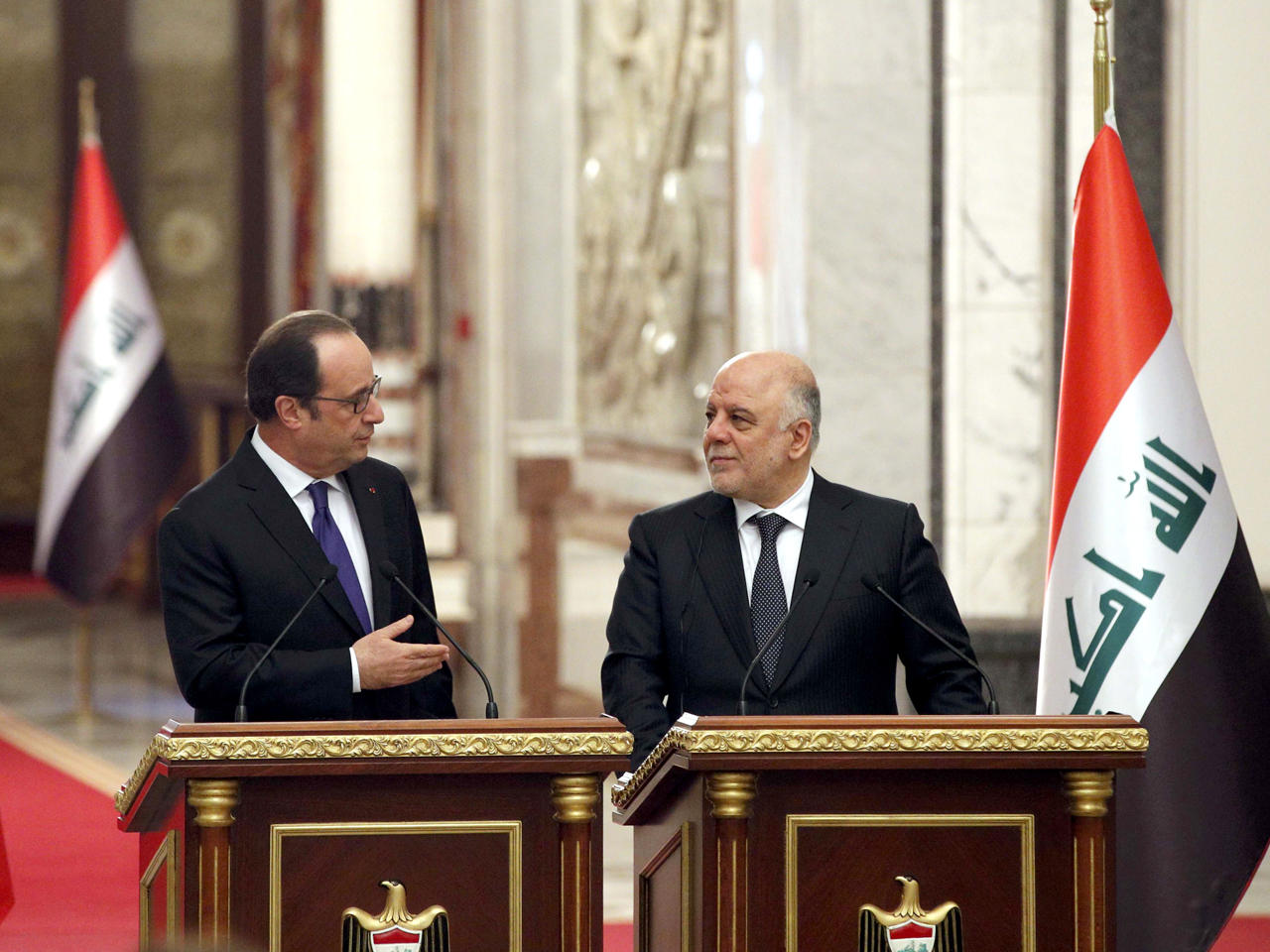 الرئيس الفرنسي فرنسوا هولاند ورئيس الوزراء العراقي حيدر العبادي