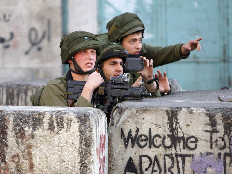 صورة أرشيفية لجنود الاستيطان الاسرائيلي في الأراضي الفلسطينية