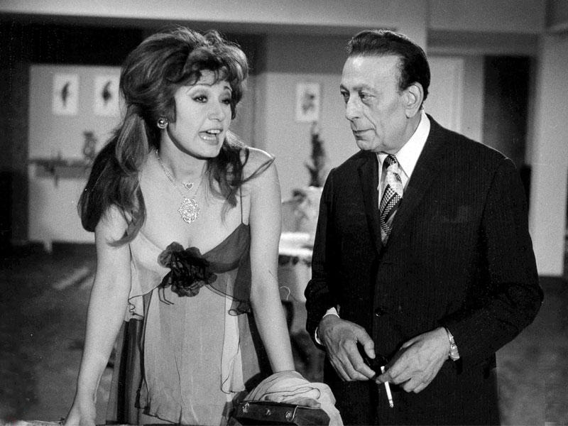 مديحة كامل مع محمود المليجي في أحد الأعمال السينمائية