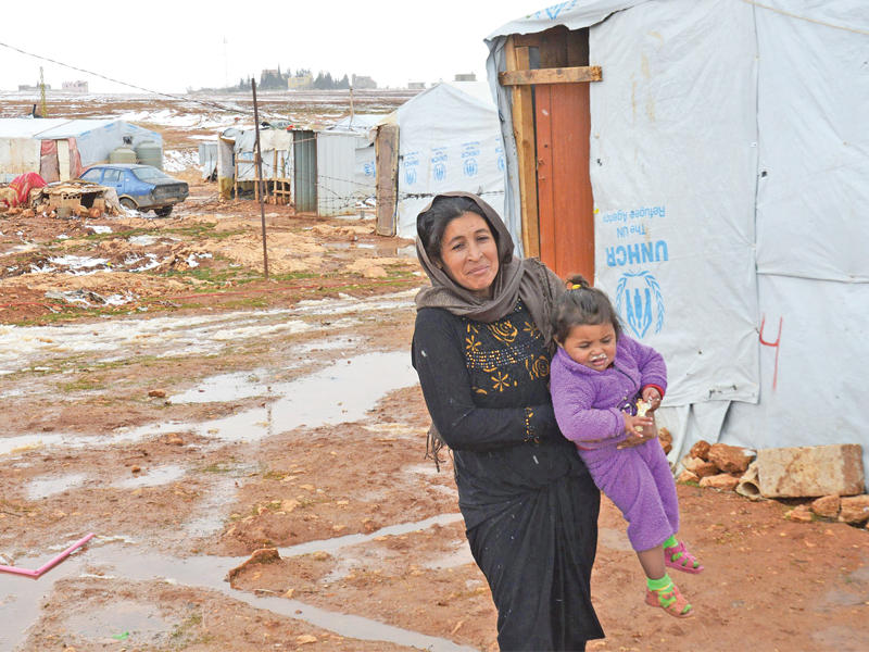 لاجئة سورية في البقاع أمس   (أ ف ب)