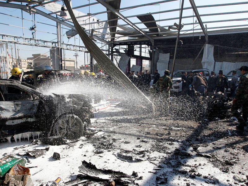 ارشيفية| موقع انفجار سيارة مفخخة في مرآب لتصليح السيارات في العاصمة بغداد