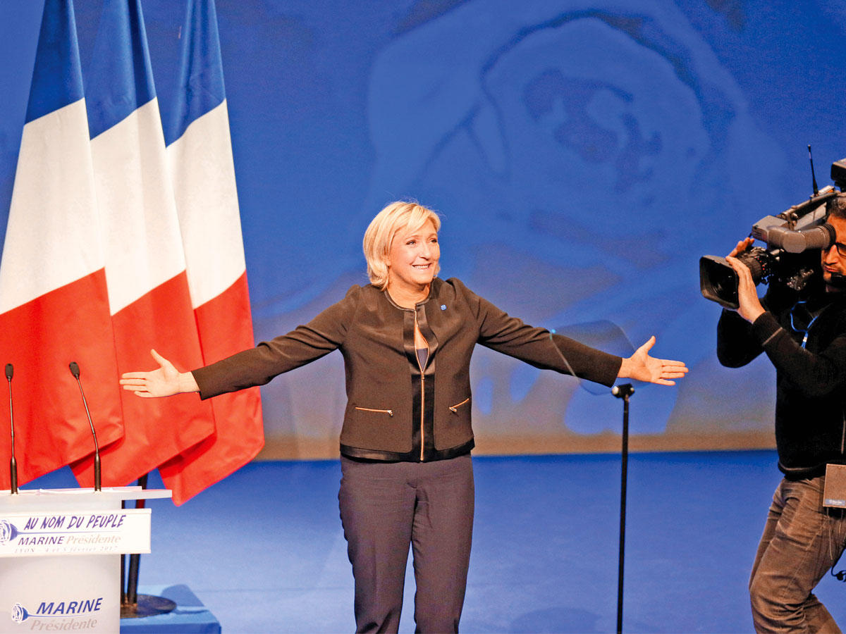 مارين لوبن في ليون أمس   (رويترز)