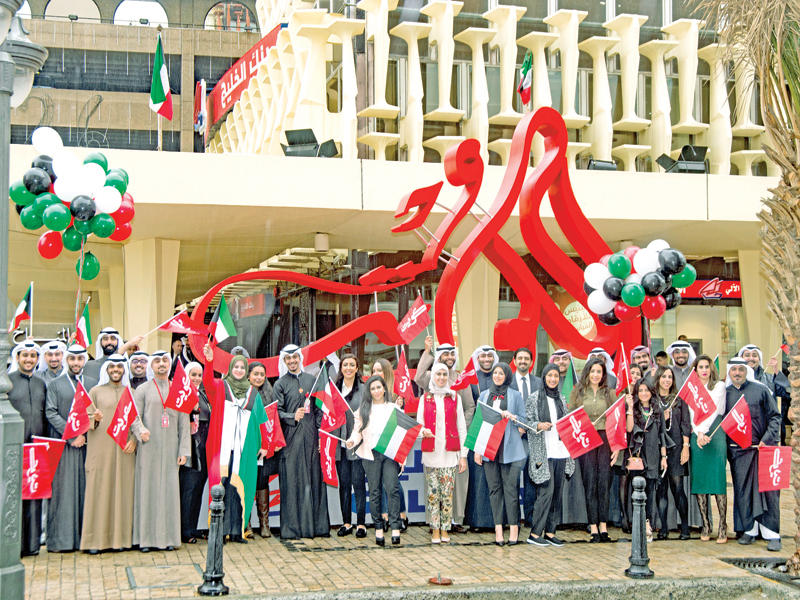 موظفو بنك الخليج يحتفلون بالأعياد الوطنية