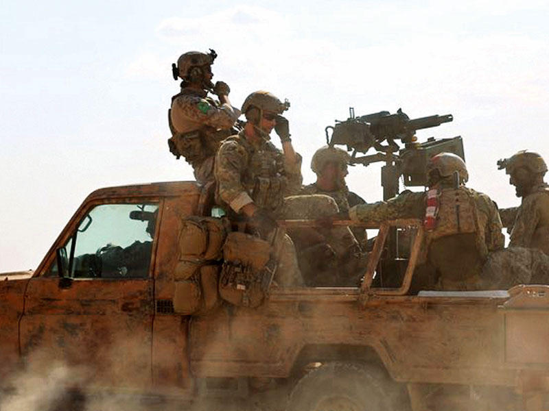 جنود أميركيون قرب منبج   (أ ف ب)