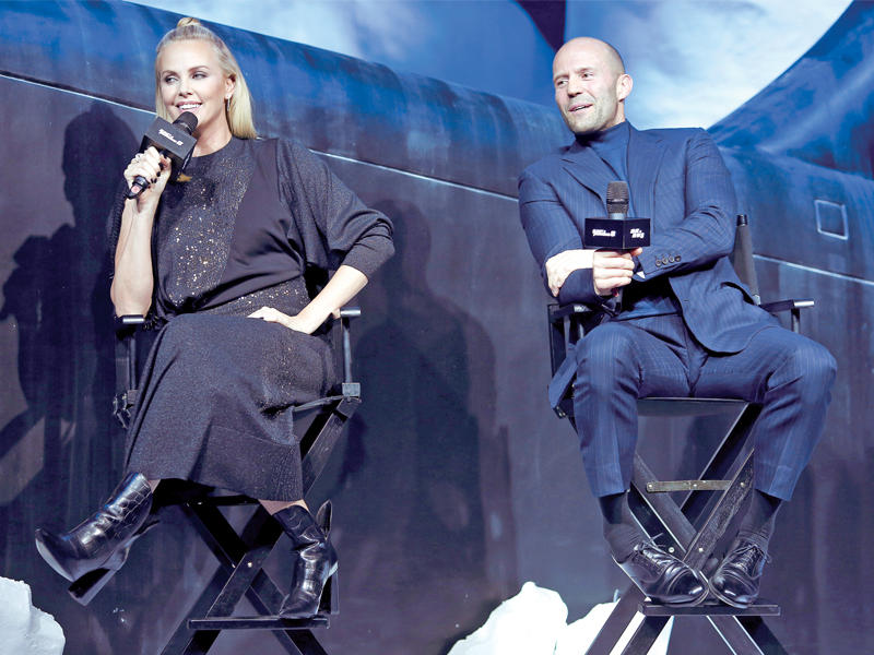 تشارليز ثيرون مع جيسون ستاثام