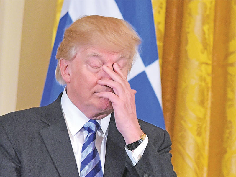 ترامب أمس الأول خلال احتفال باستقلال اليونان في البيت الأبيض        (أ ف ب)