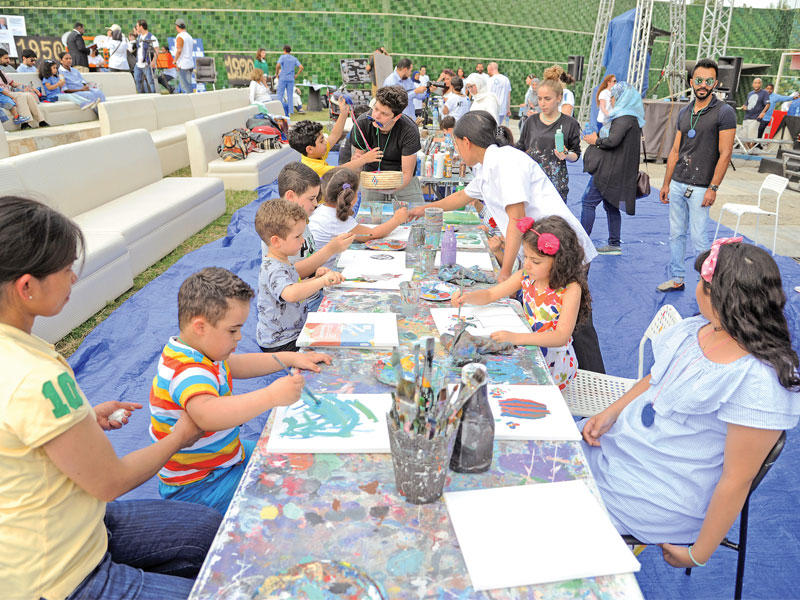 جانب من الاحتفال بيوم التوحد في حديقة الشهيد (تصوير عوض التعمري)