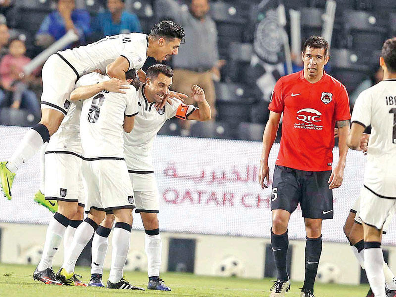 لاعبو السد يحتفلون وسط خيبة لاعبي الريان