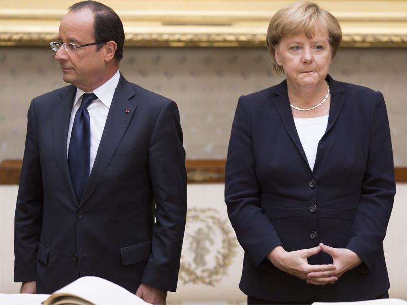 ميركل وهولاند