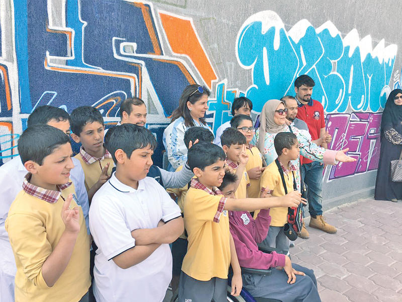 مشاركون في فعالية هيئة الإعاقة