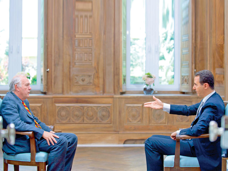 الأسد خلال مقابلة مع وكالة «فرانس برس»  (أ ف ب)