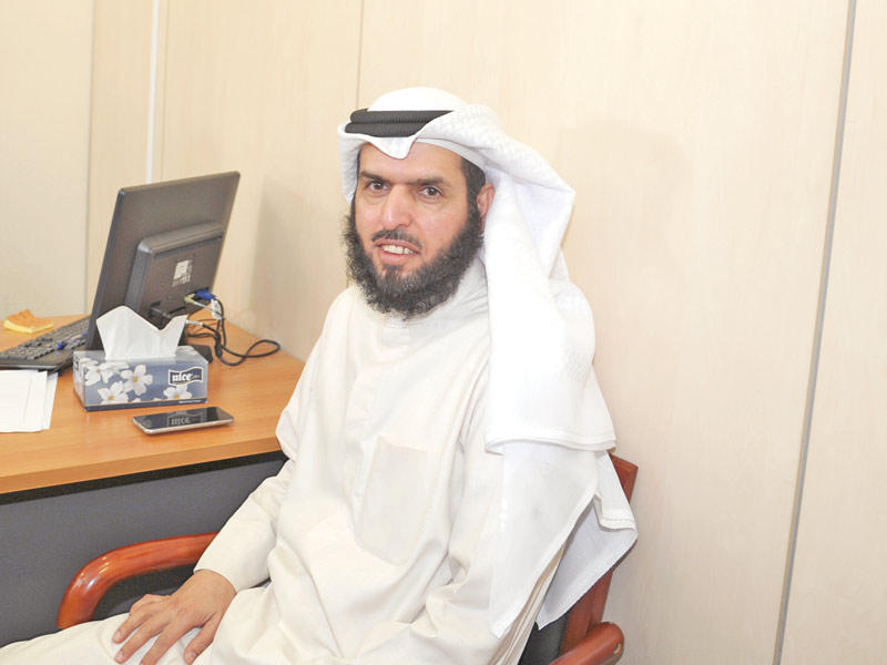  النائب عادل الدمخي